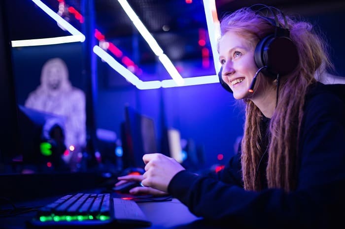 beautiful professional girl gamer playing